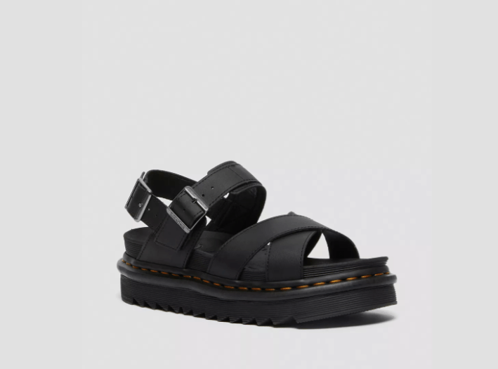 A cross-strap sandal is a summer staple