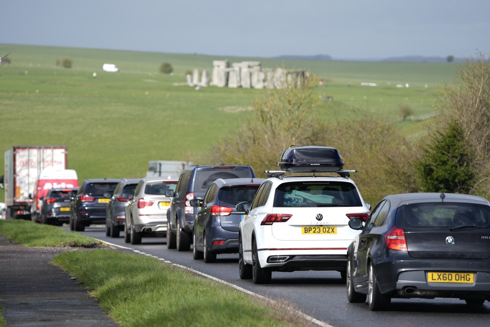 Cars make their way along the A303 past Stonehenge in Wiltshire