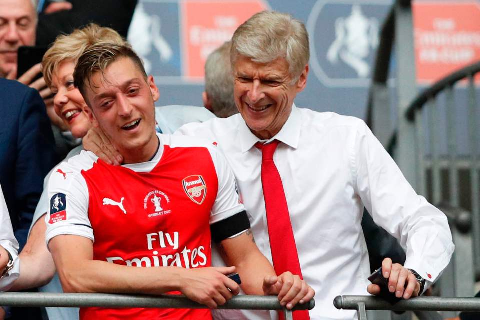 Mesut Ozil with Arsene Wenger