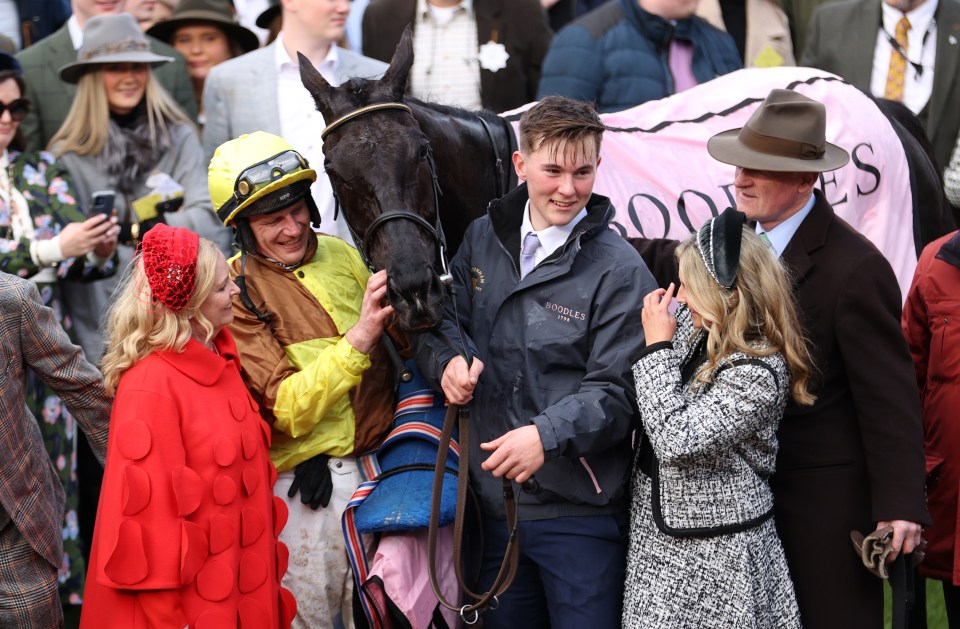 Mullins, right in hat, wins racing's most prestigious contest a month after losing his mum