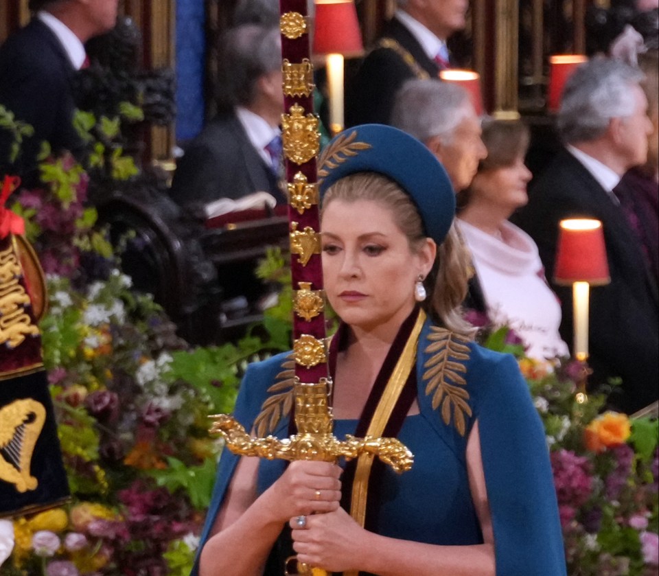 Lord President of the Council, Penny Mordaunt, carries the Sword of State