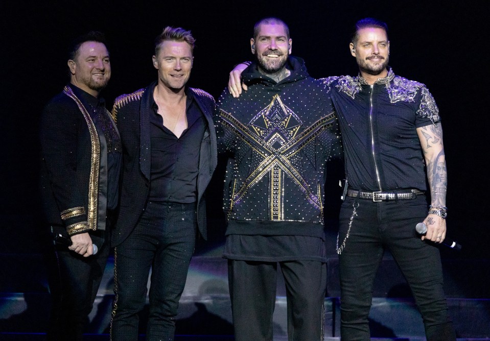 Mikey Graham, Ronan Keating, Shane Lynch and Keith of Boyzone perform on stage during their Thank You & Goodnight Tour