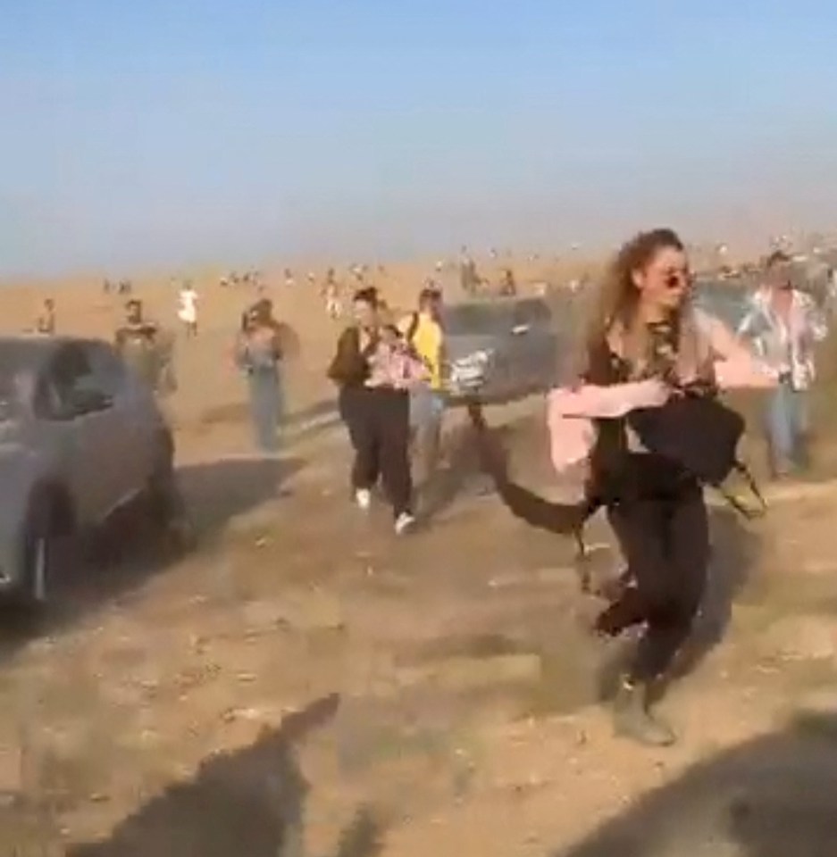 Terrified partygoers fleeing during a surprise attack launched by Hamas at the Nova Music Festival