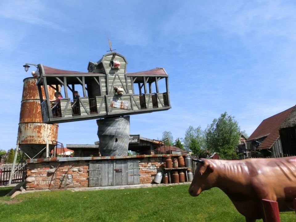 The flying cowshed is one of the park's many bizarre rides