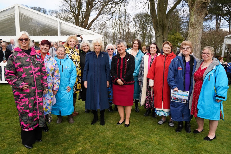 Queen Camilla with members of the Manx Bluetits swimming club