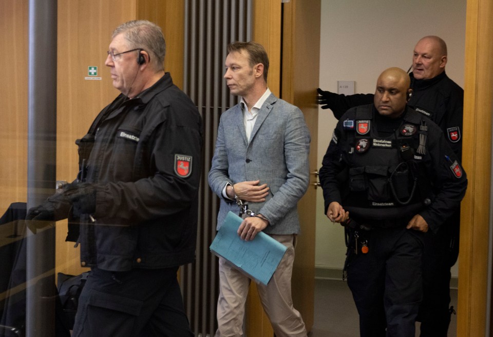 Christian Brueckner arrives handcuffed in court in Germany as part of his latest ongoing rape trial