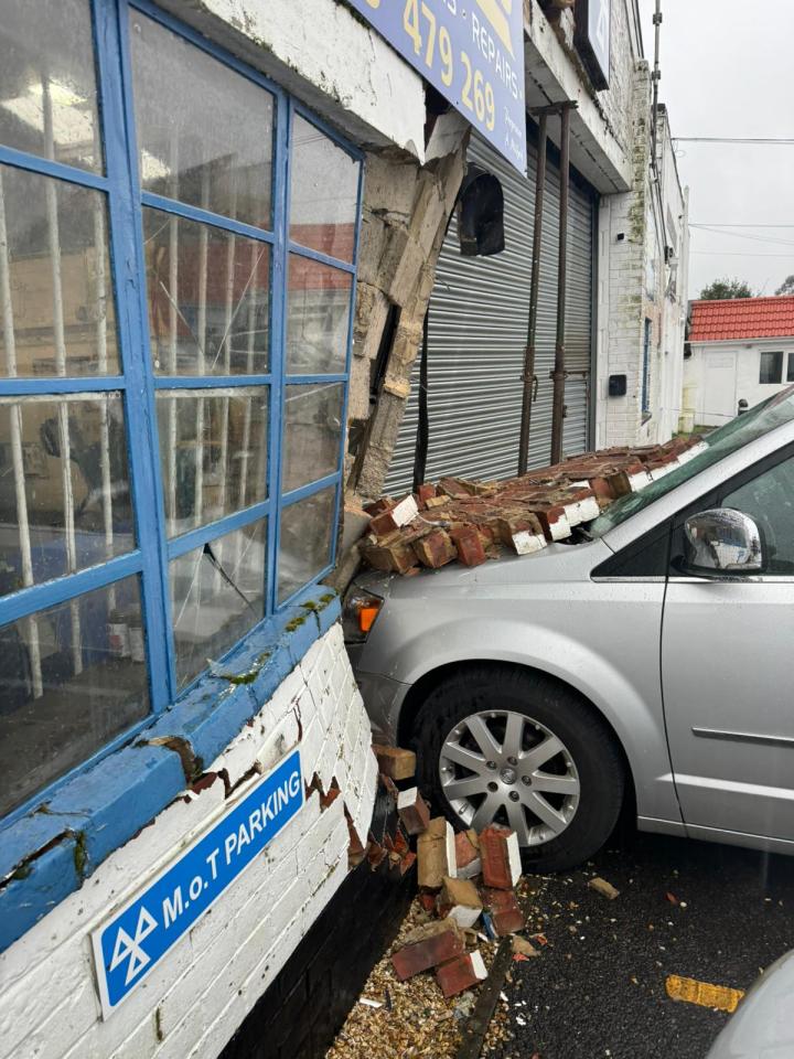 The motor remains lodged in the wall as the damage makes it unsafe to remove