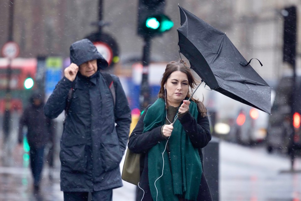 Londoners battled with the wind and rain on Westminster Bridge earlier this morning