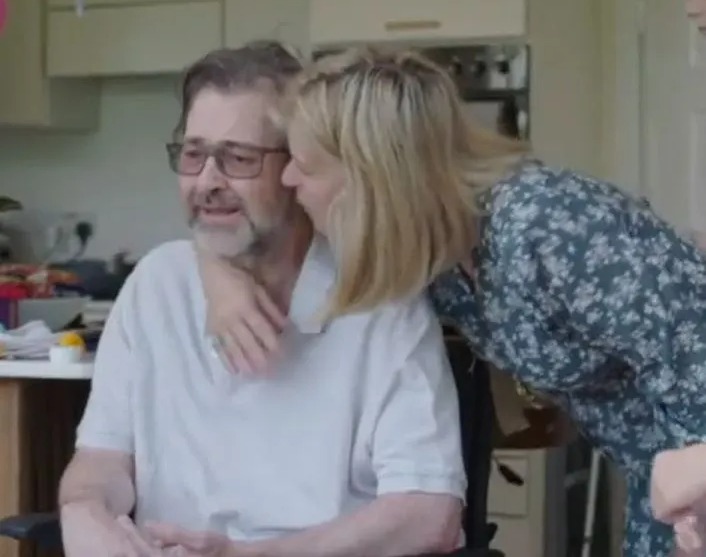 Kate Garraway hugs her late husband Derek Draper in scenes from her new ITV documentary