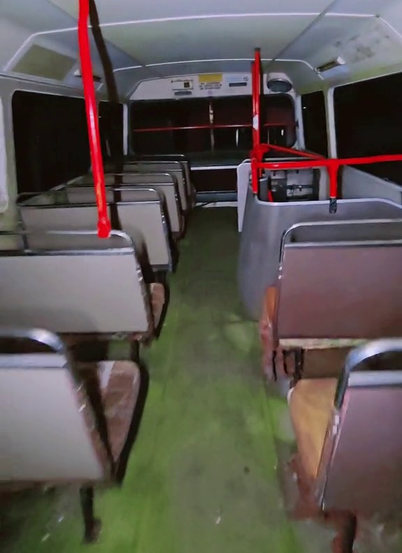 The influencer explored an eerie and decaying double-decker bus