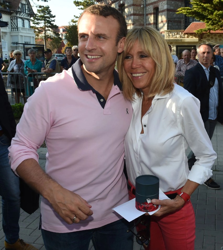 French President Emmanuel Macron denies his wife Brigitte was born as a man