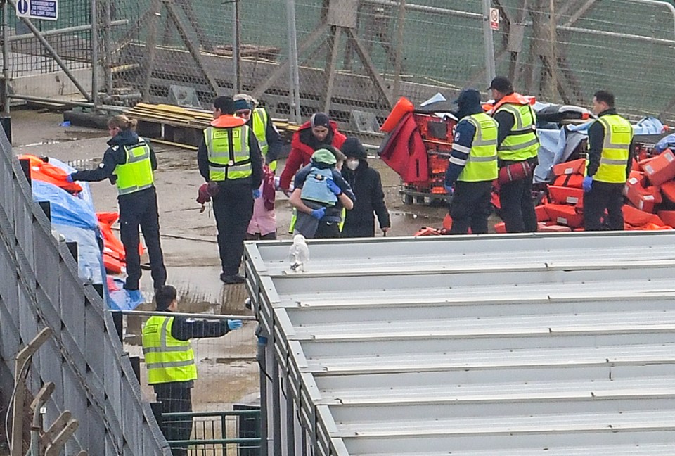 The group had to be pulled from the water after their boat capsized