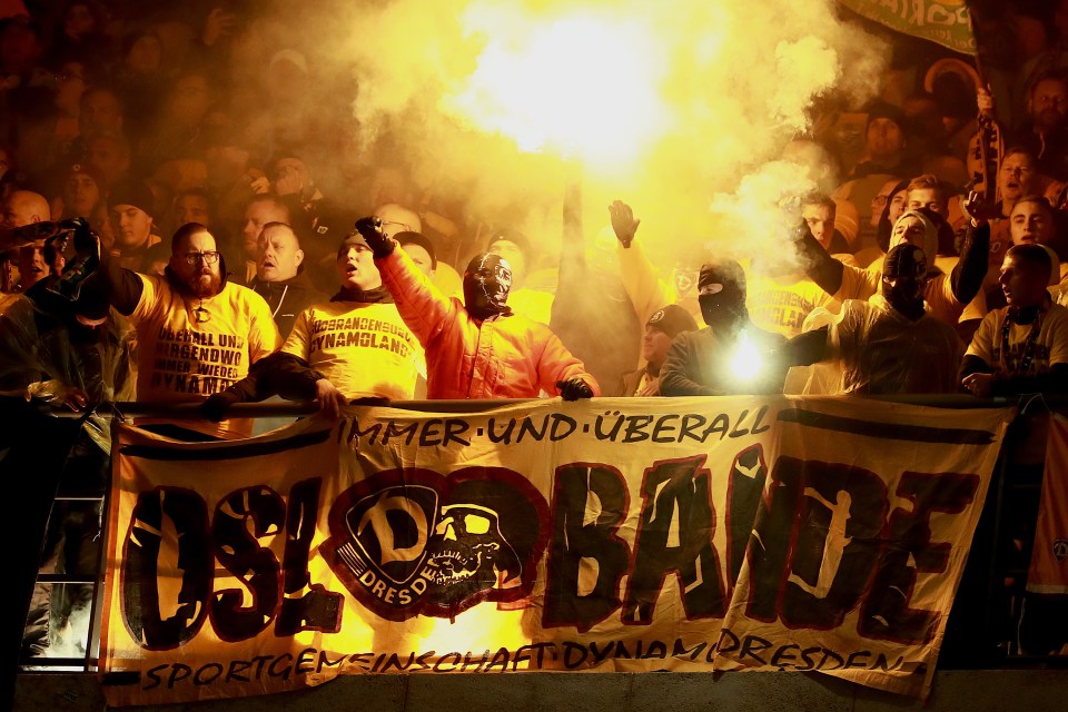 Masked Dynamo Dresden fans let off flares