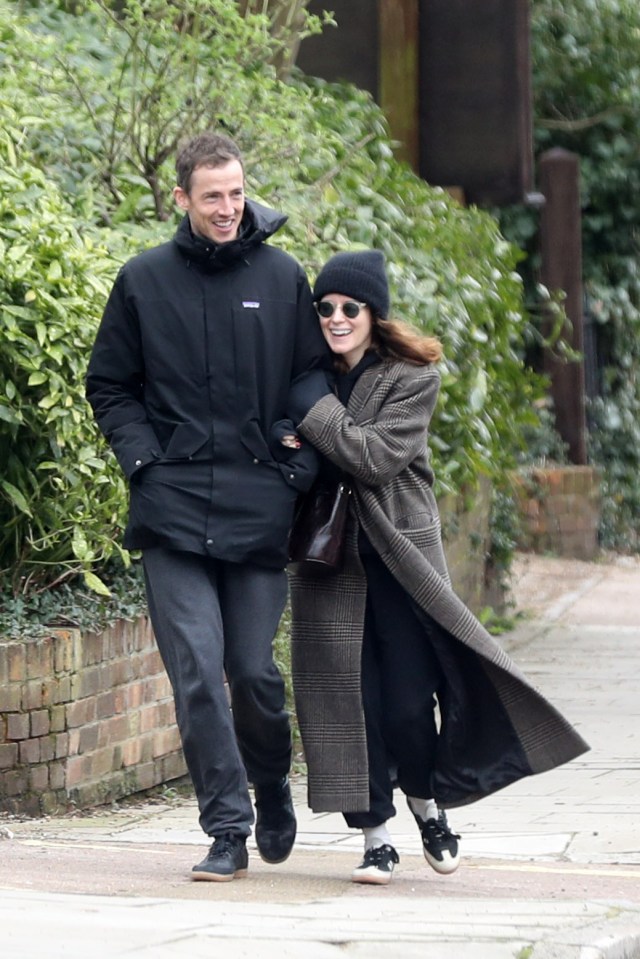 Actress Claire Foy couldn’t stop smiling when photographed on a day out with her new man Charlie Cunningham