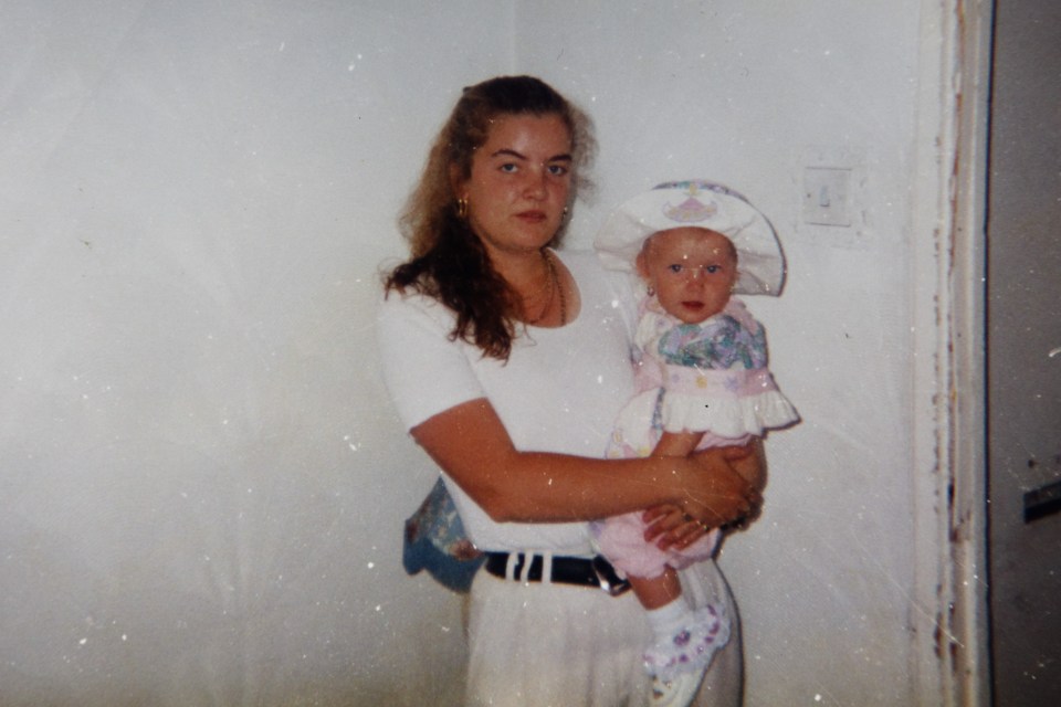 Diane Jones holding her daughter before they died in a house fire at their home