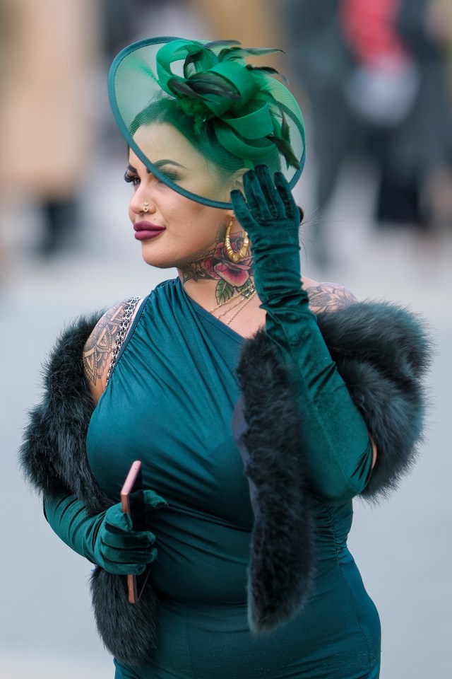 One woman took the green theme seriously as she dressed with gloves, dress and fascinator in the colour scheme