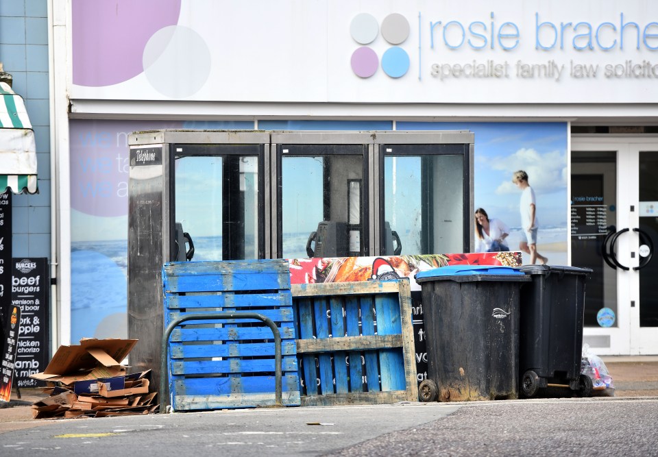 Rubbish piled up outside a law firm