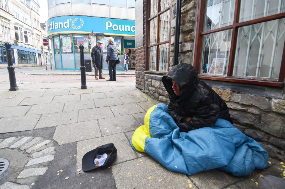 Beggars can be seen around the high street