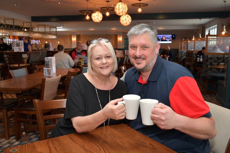 Gill and Andy Bishop enjoy a coffee as some of the first customers in the newly opened pub