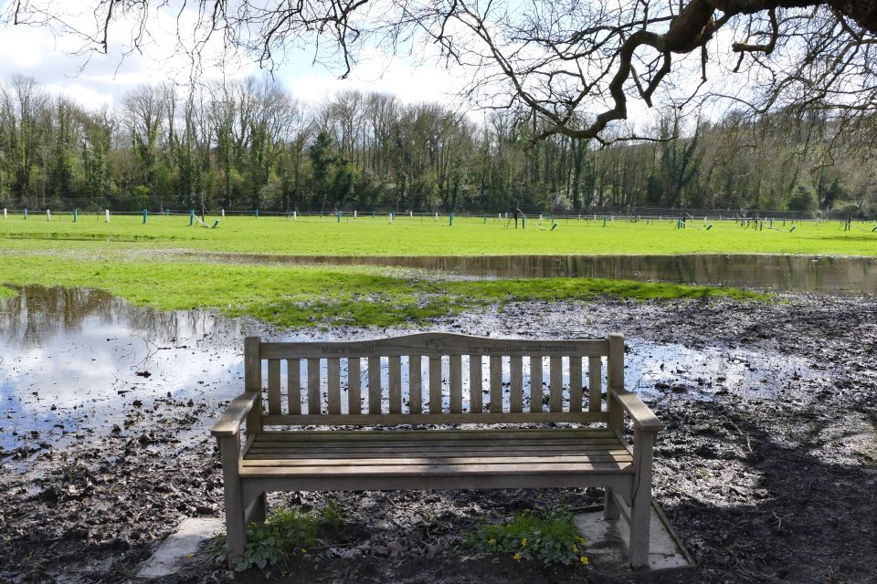 Flooding in the recreation ground along the chalk stream by The Pilgrims Trail in Winchester after the recent heavy rainfall