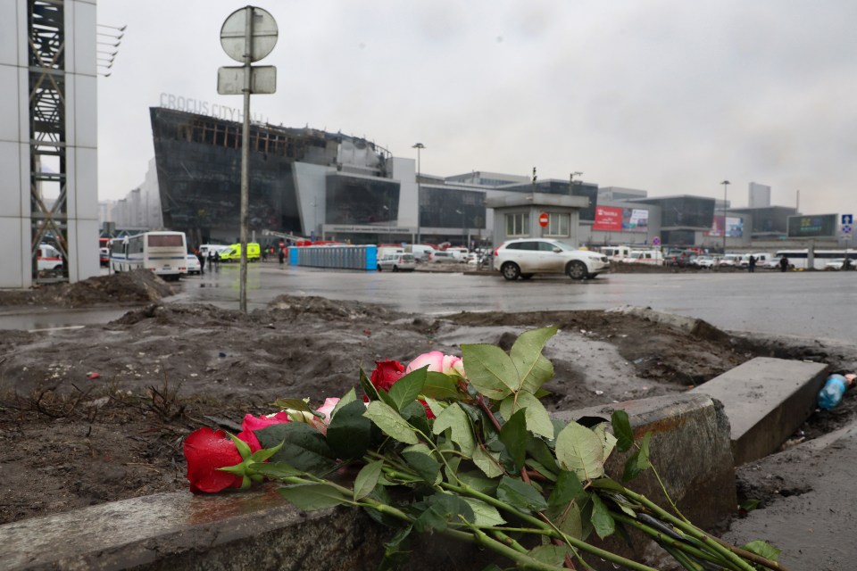 Flowers are seen left at the scene