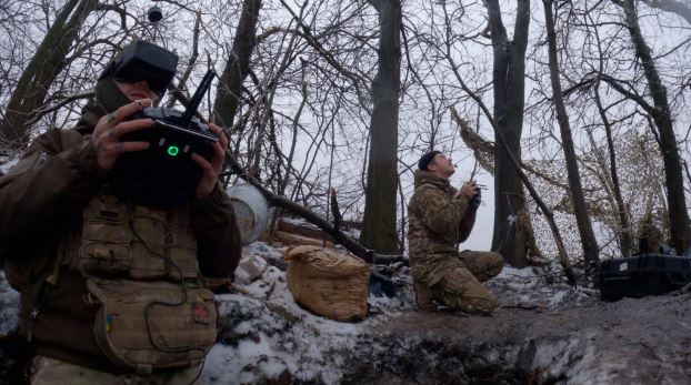 A later part of the video captures the soldiers operating drones and targeting opposition forces