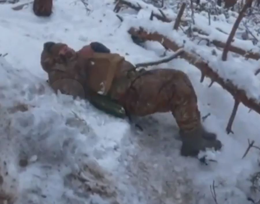 One of the men is wounded after being shot by opposition forces after making it into the woods