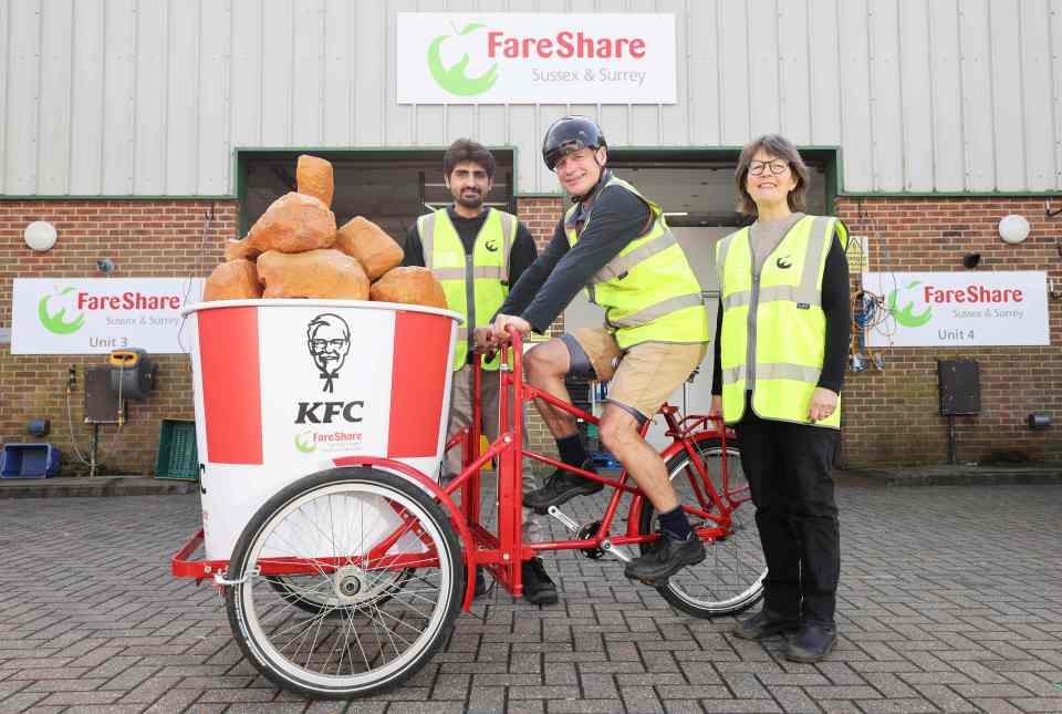 Sussex & Surrey volunteers Jo Hyne, Muhammad Anas Waris and Adam Hall with KFC and FareShare's new Delivery Bucket Bike