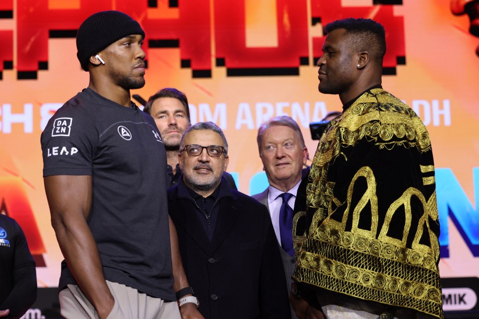 Joshua facing off with Ngannou