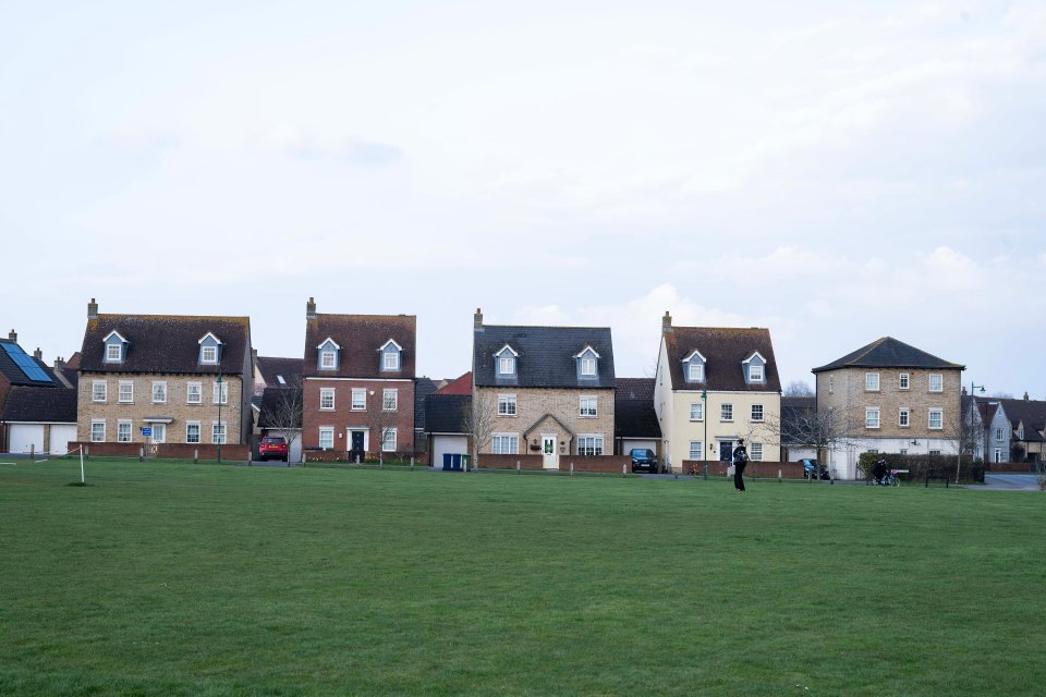 The quaint houses are built in a faux-traditional style