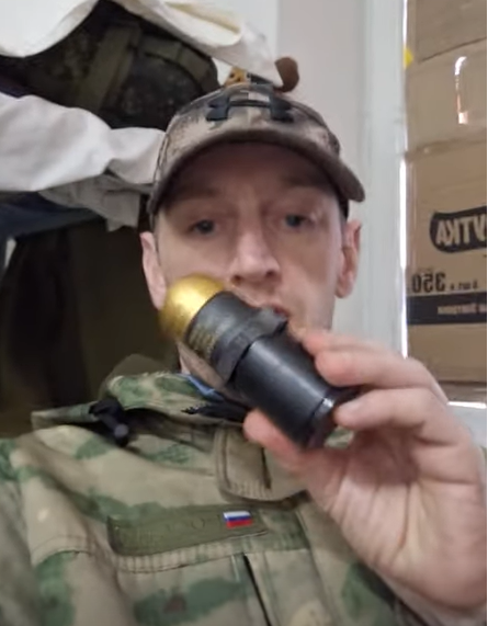 Ben Stimson (pictured posing with a grenade), from Oldham, UK, moved to Russia to fight in Putin's army