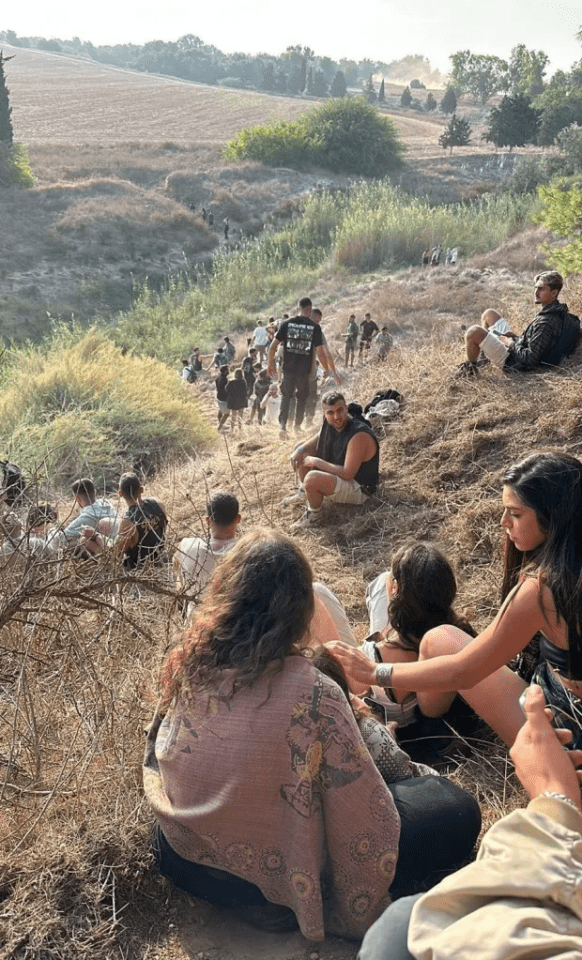 Festival-goers hiding amid the attack