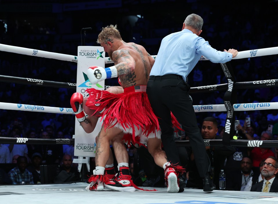 Jake Paul punches Bourland to the floor