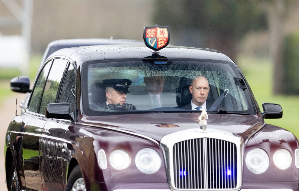 The King gazed out of the window while being driven from the estate