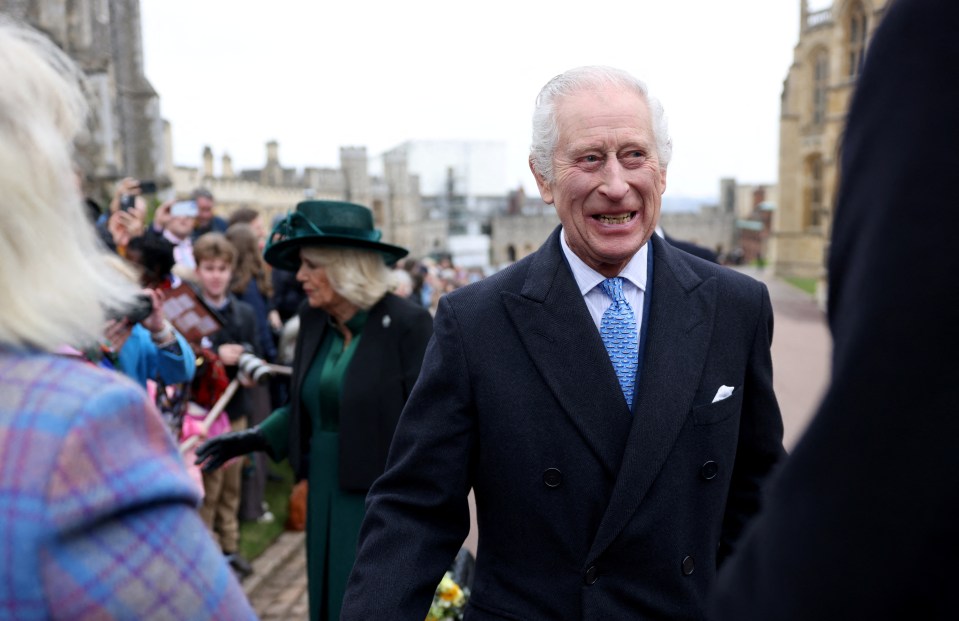 Charles was all smiles Sunday as he walked the Windsor rope line