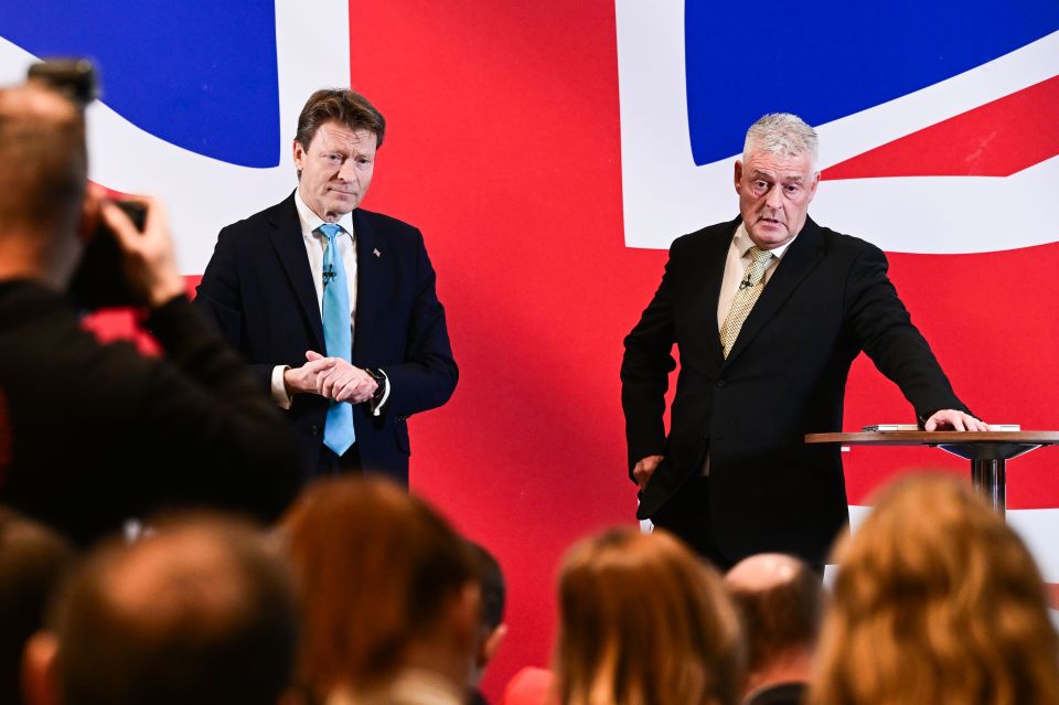 Richard Tice and Lee Anderson pose for pictures at an event in Central London