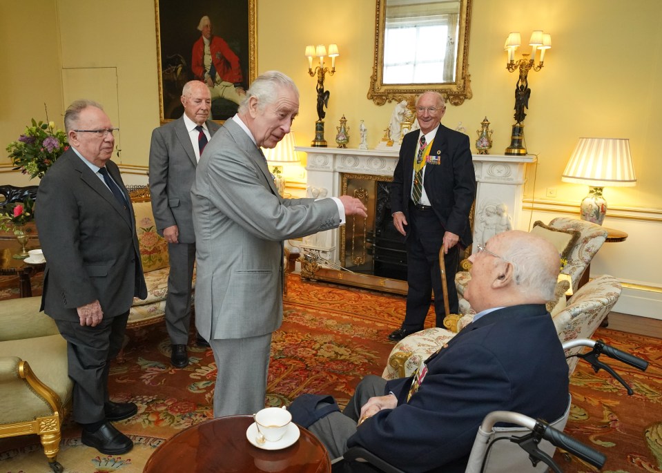 King Charles III met with Veterans of the Korean War -  Alan Guy, Mike Mogridge, Brian Parritt, and Ron Yardley - at Buckingham Palace