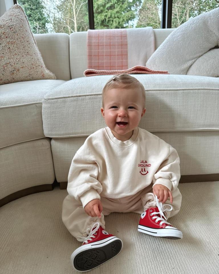 She also posted an adorable snap of her daughter bambi playing by her cream sofas