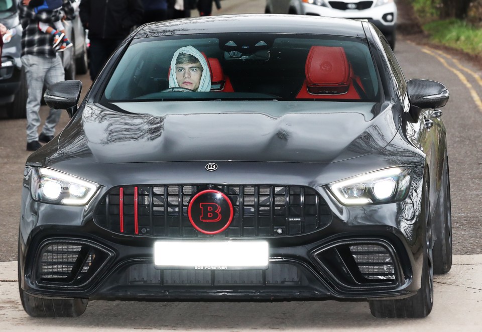 Williams behind the wheel last year as he arrived for Man Utd training