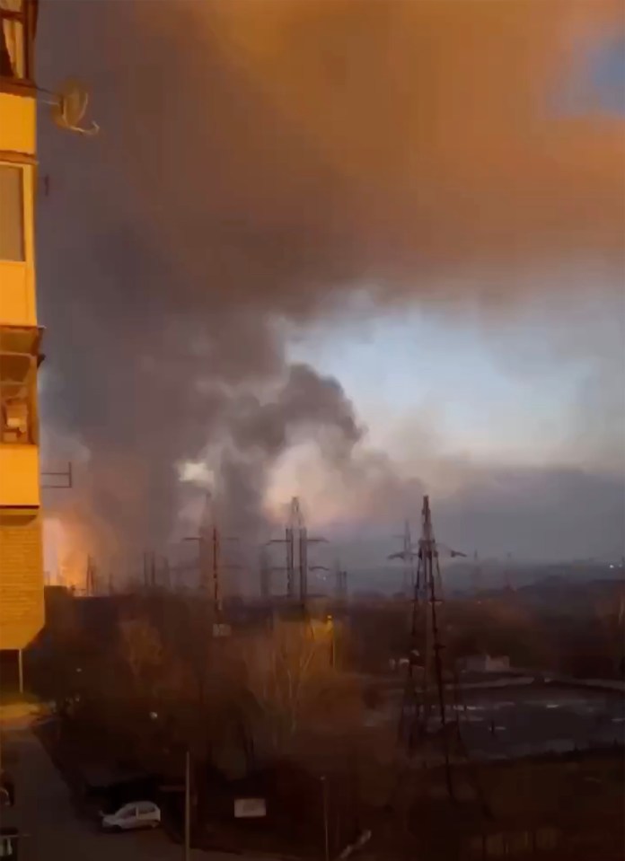 Black smoke rises above the Dnipro Hydroelectric Power Plant in the early hours of this morning