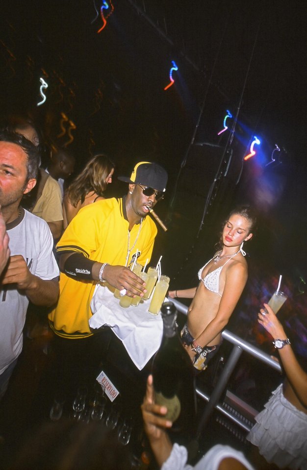 P Diddy getting the drinks in at a nightclub in Ibiza