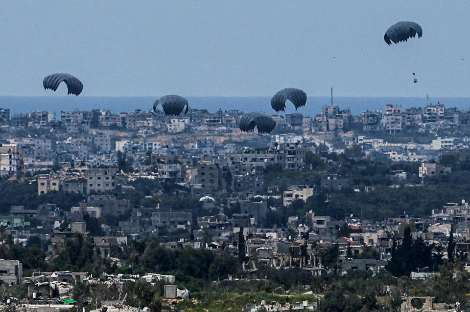 Aid parachutes being dropped into northern Gaza on March 24