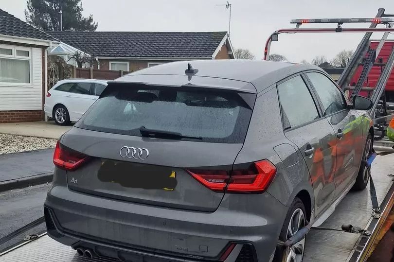 An uninsured Audi was seized for obstructing while parked