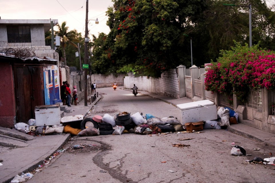 Residents in Port-au-Prince have constructed makeshift barricades made of kitchen appliances and clothes