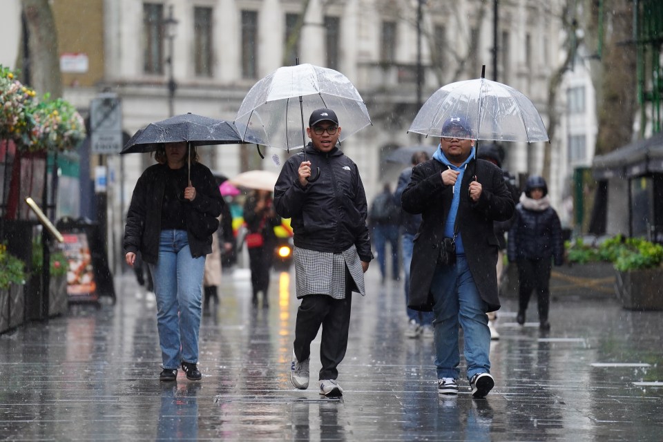 Along with the sunshine, showers are also expected over the long bank holiday weekend with visitors to London's Leicester Square getting soaked in the rain yesterday