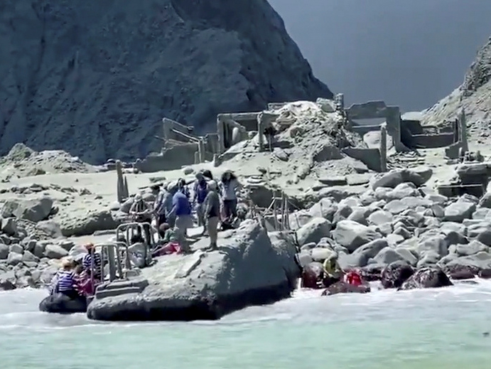 Terrified tourists wait to be evacuated from White Island