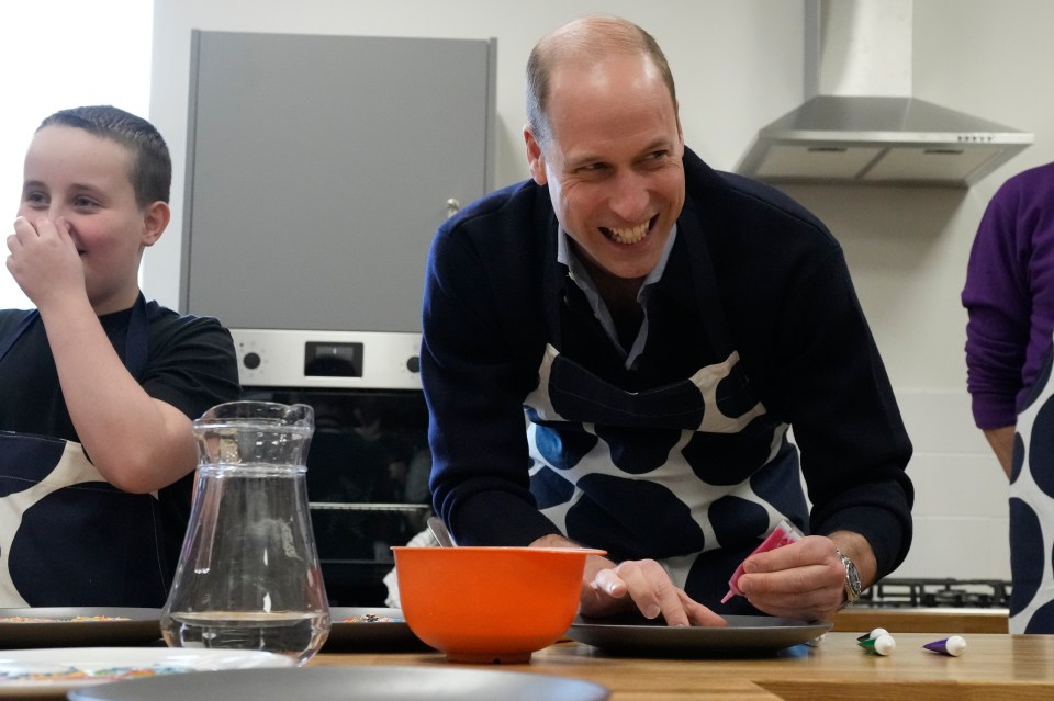 William today joked his wife Kate 'is the arty one' as he visited a youth group