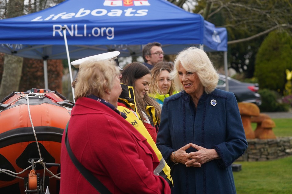 Queen Camilla met representatives from the RNLI as she visited community groups in Onchan, Isle of Man