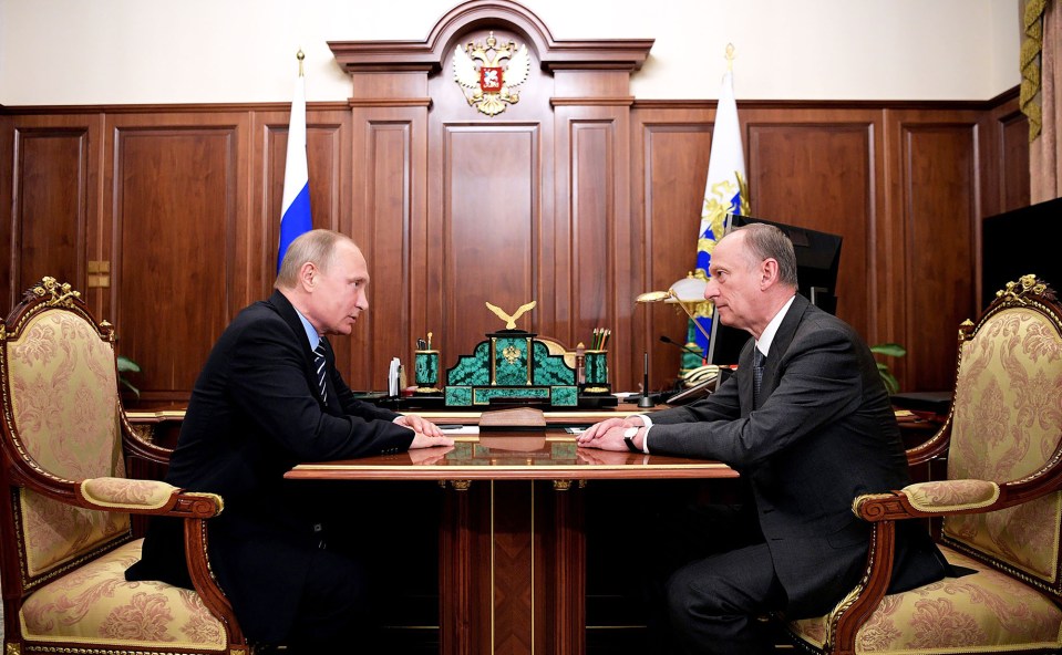 Patrushev, Putin's top security aide, pictured at a meeting with the Russian dictator