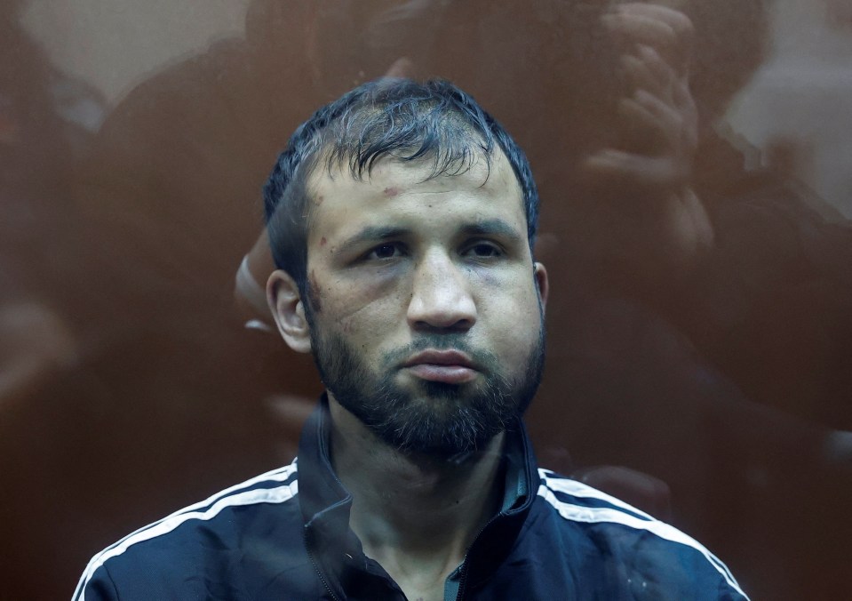 Shamsidin Fariduni, a suspect in the concert attack, awaiting a hearing at the Basmanny district court